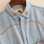 Nasngwam.のFLOWER DENIM SHIRTS