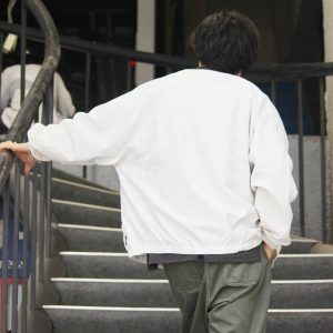 AXESQUINの機能美と日常をつなぐカーディガン