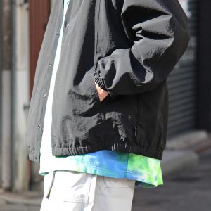 AXESQUINの機能美と日常をつなぐカーディガン