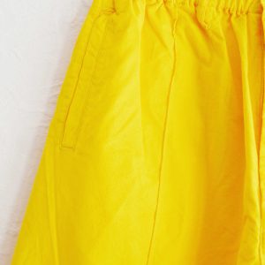 夏のスタイリングに効く一本。N.O.UN “PIN TUCK PANTS” がビタミンカラーで登場。