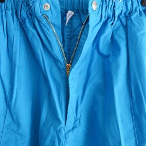 夏のスタイリングに効く一本。N.O.UN “PIN TUCK PANTS” がビタミンカラーで登場。